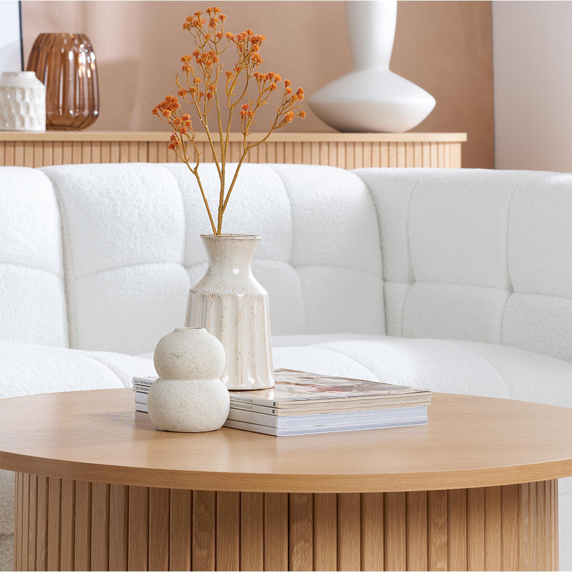 Product photograph of Axel Oak Fluted Round Coffee Table from Choice Furniture Superstore.