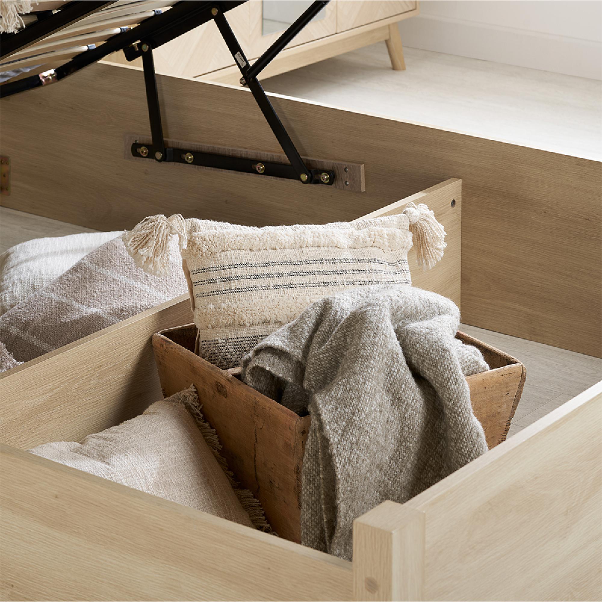 Product photograph of Herringford Oak Ottoman Storage Bed - Sizes Available from Choice Furniture Superstore.