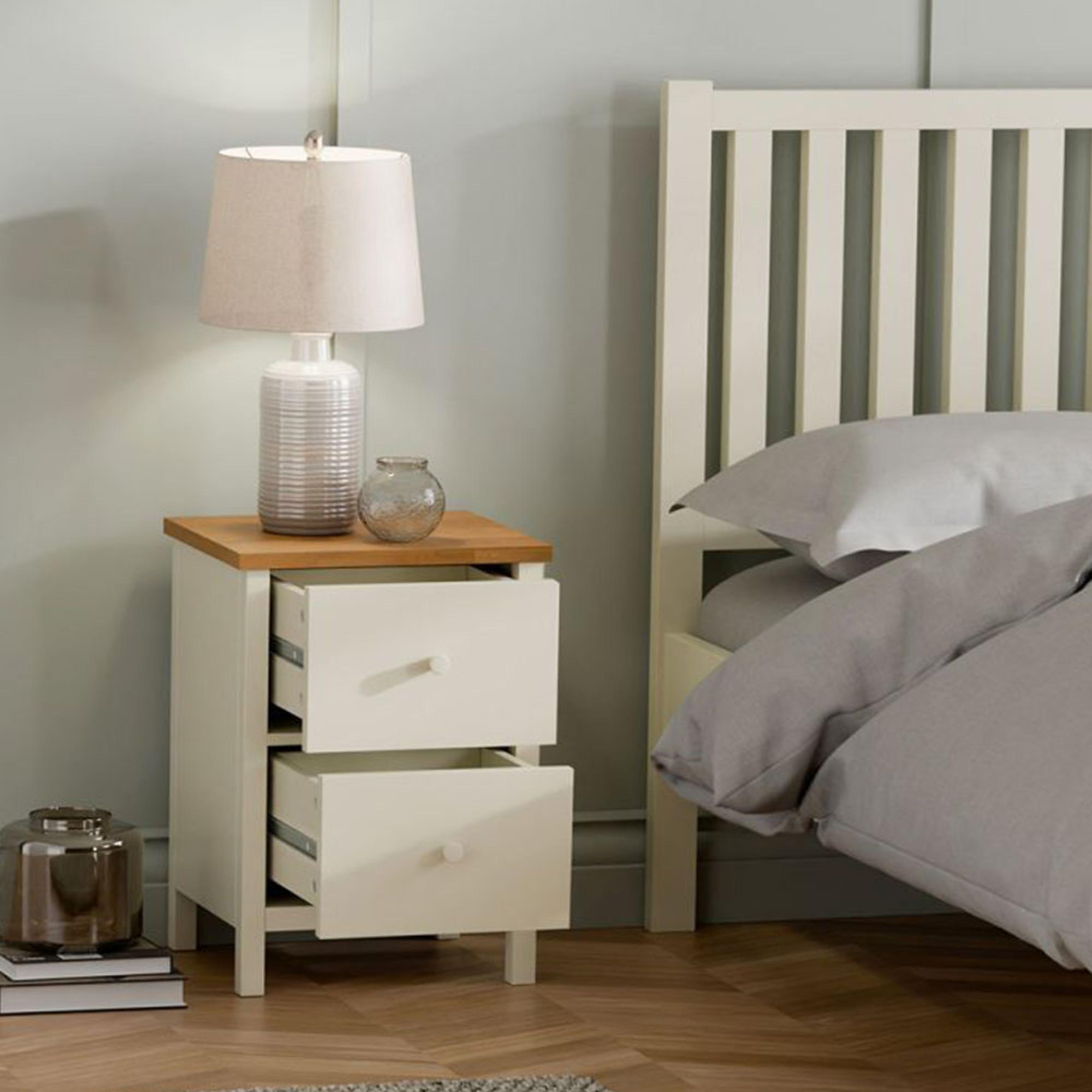 Product photograph of Coxmoor Ivory Painted 2 Drawer Bedside Table from Choice Furniture Superstore.