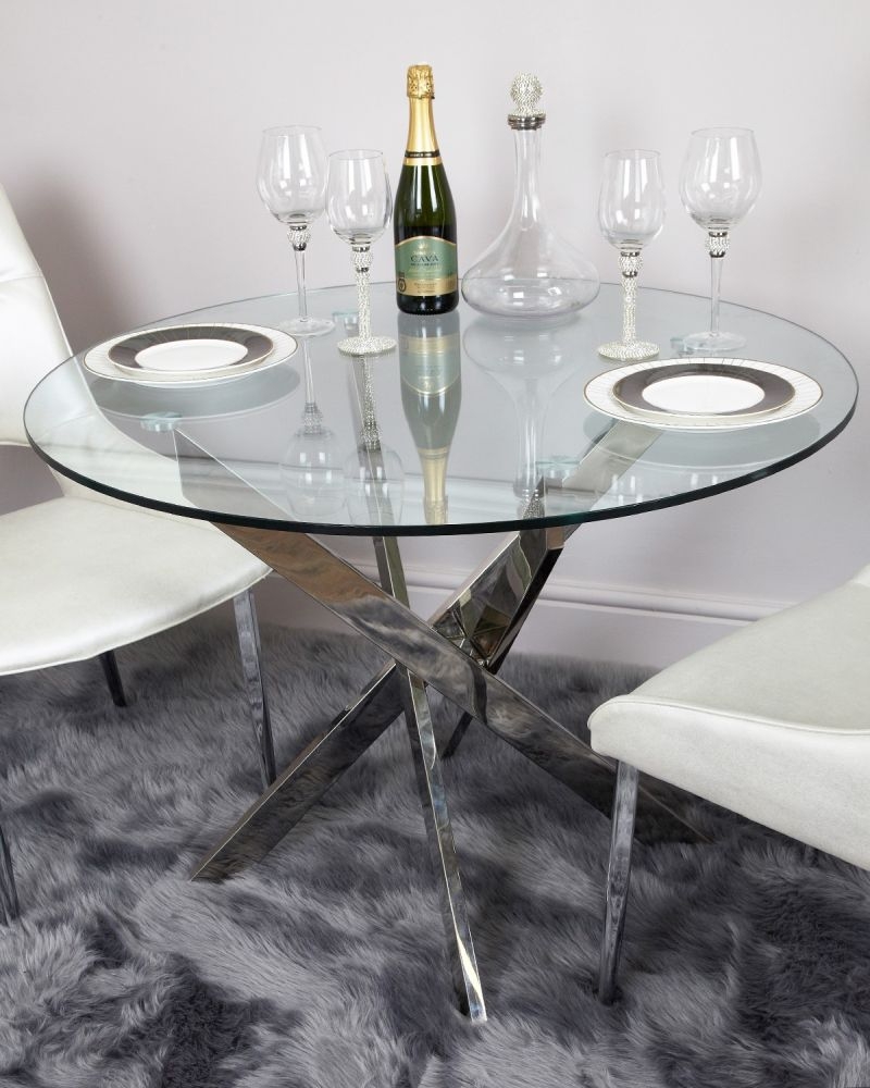 Product photograph of Nova Value Glass And Chrome Round Dining Table from Choice Furniture Superstore.