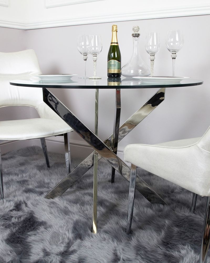 Product photograph of Nova Value Glass And Chrome Round Dining Table from Choice Furniture Superstore.