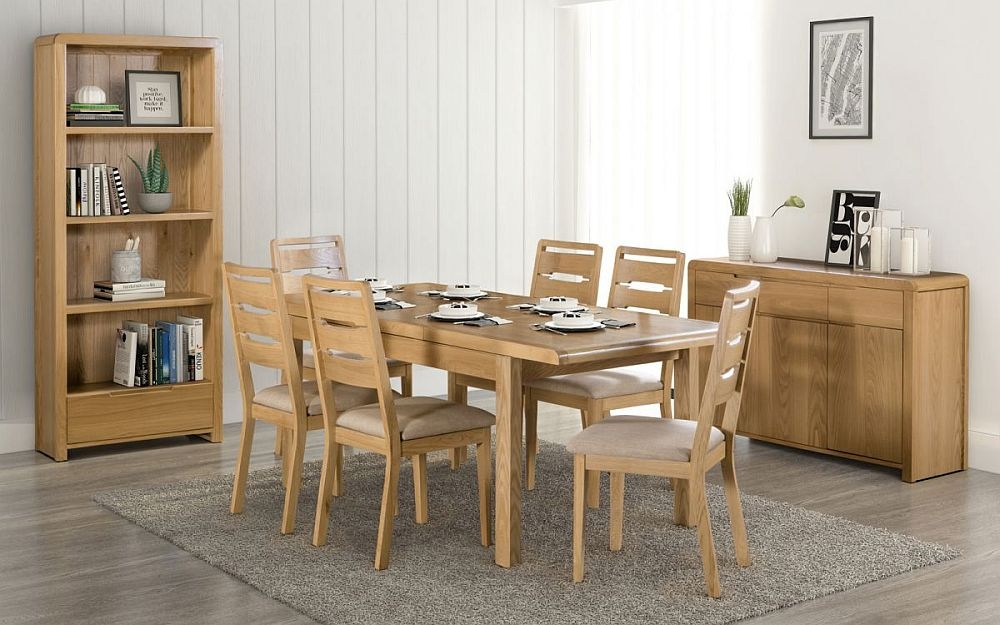 Product photograph of Curve Oak 6-8 Seater Extending Dining Table from Choice Furniture Superstore.