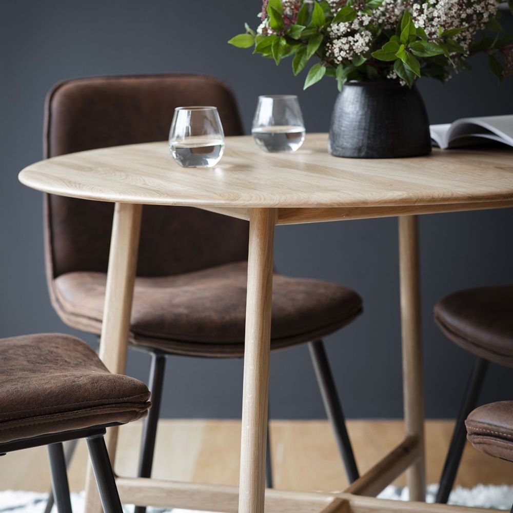 Product photograph of Madrid Oak Round Dining Table - 2 Seater from Choice Furniture Superstore.