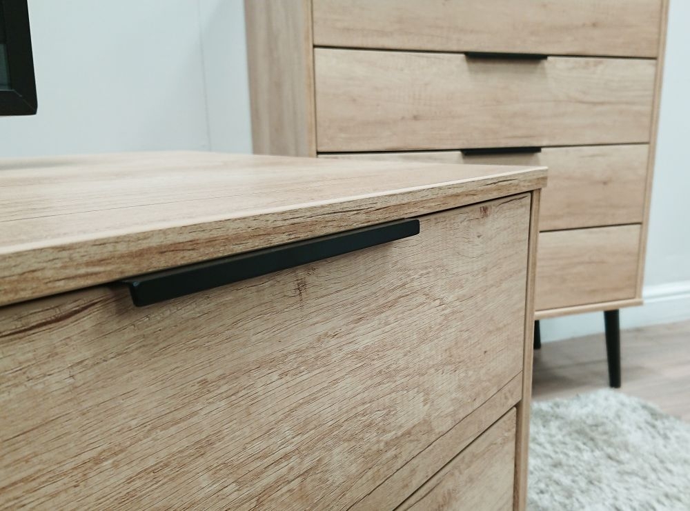 Product photograph of Hong Kong 3 Drawer Midi Chest With Wooden Legs - Nebraska Oak from Choice Furniture Superstore.