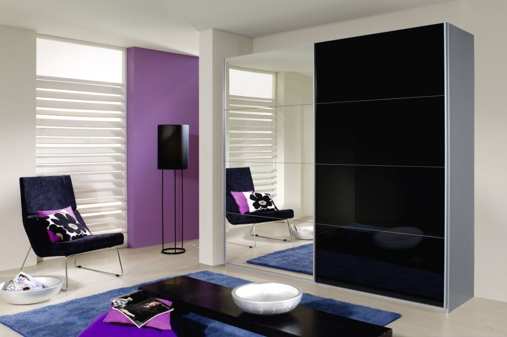 Product photograph of Rauch Quadra Glass And Mirror Sliding Wardrobe - Variation Available from Choice Furniture Superstore.