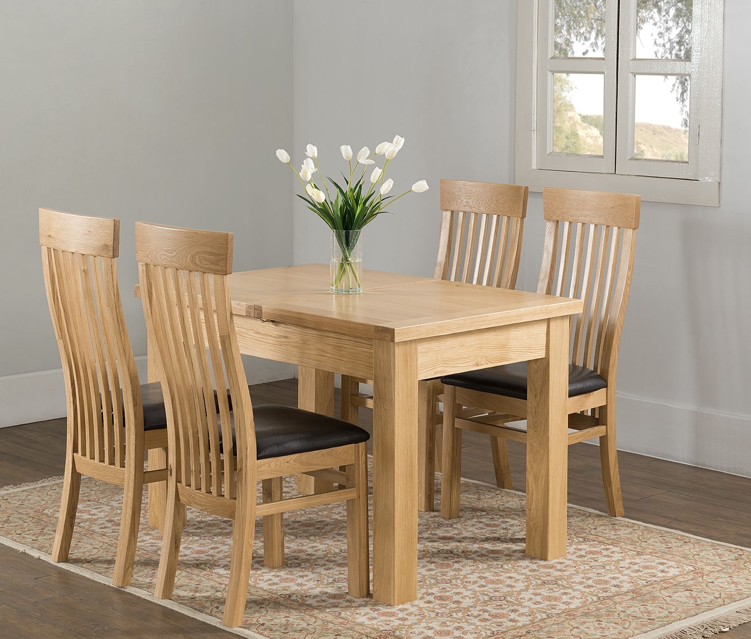 Product photograph of Cambridge Oak 4 Seater Butterfly Extending Dining Table from Choice Furniture Superstore.