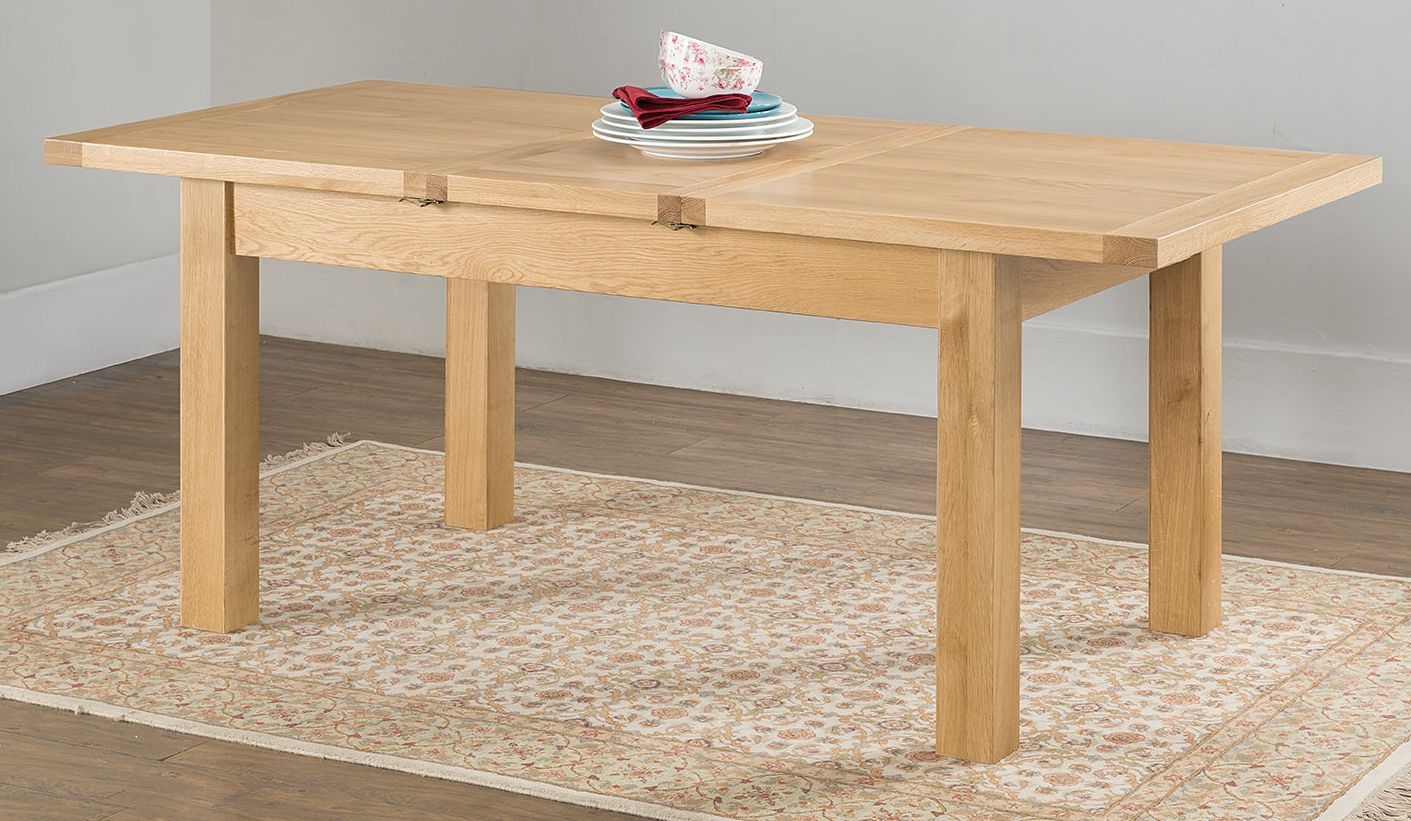 Product photograph of Cambridge Oak Large Butterfly Extending Dining Table from Choice Furniture Superstore.