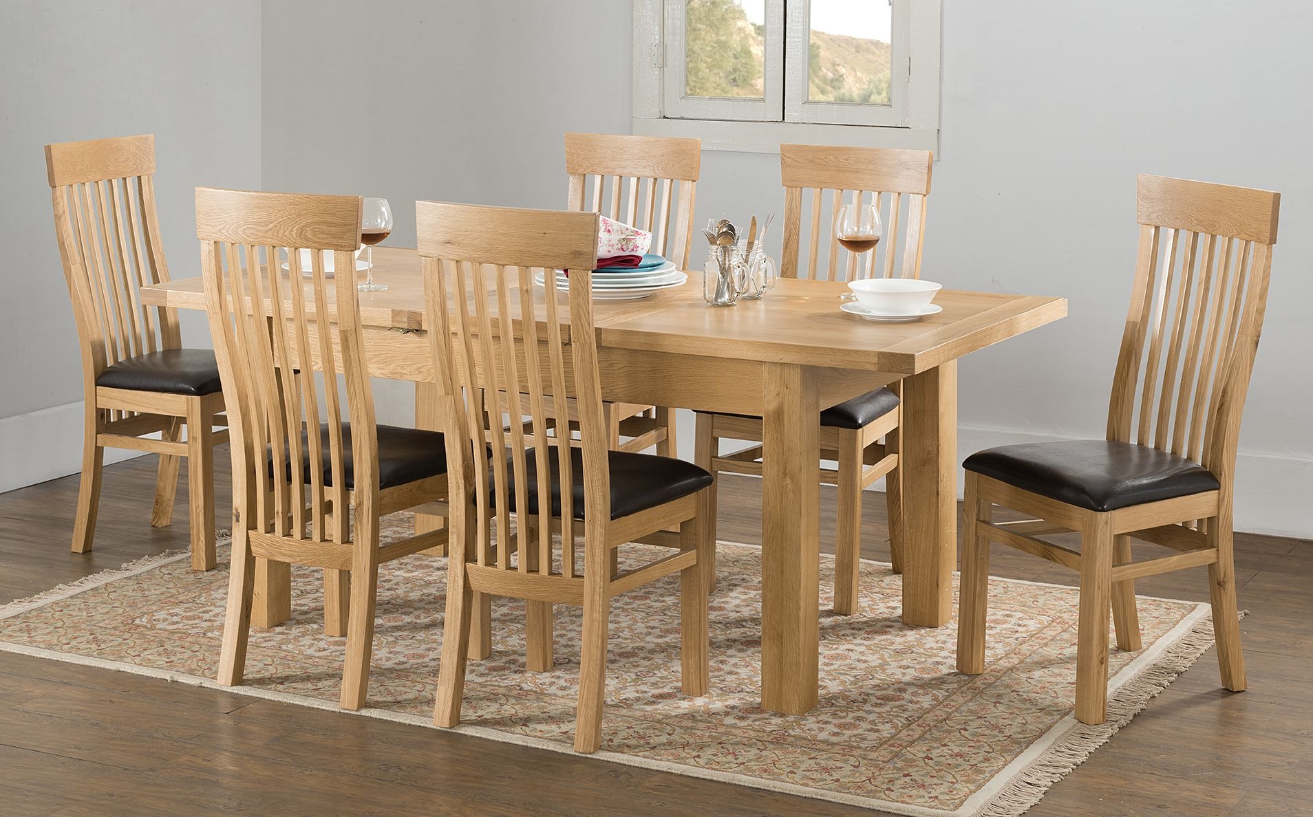 Product photograph of Cambridge Oak Large Butterfly Extending Dining Table from Choice Furniture Superstore.