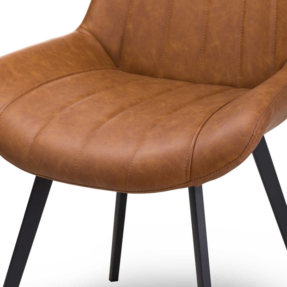 Product photograph of Casteel Tan Brown Faux Leather Dining Chair Sold In Pairs from Choice Furniture Superstore.