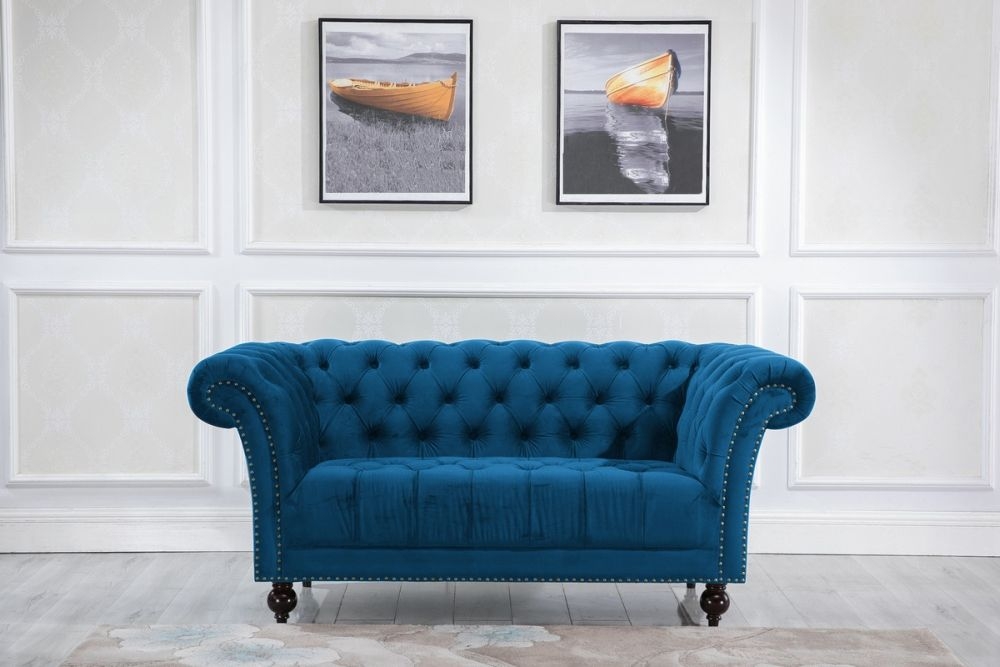 Product photograph of Chester Blue Velvet Fabric 2 Seater Sofa from Choice Furniture Superstore.