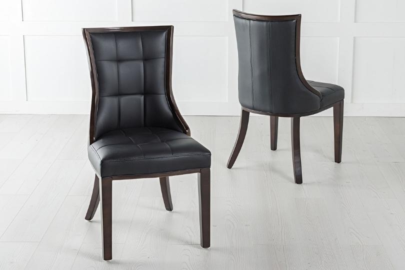 Product photograph of Paris Black Dining Chair Leather - Faux Pu With Brown Legs And High Gloss Side Trims from Choice Furniture Superstore.