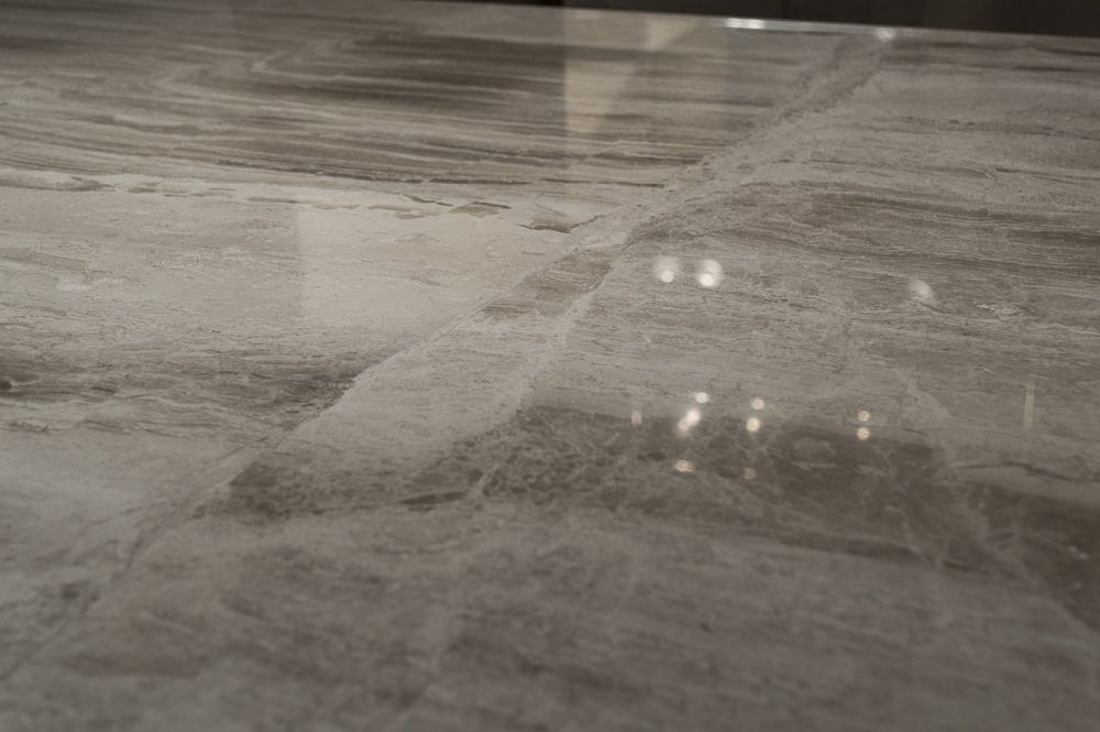 Product photograph of Blade Marble Dining Table With Wooden Pedestal Base - Variation Available from Choice Furniture Superstore.