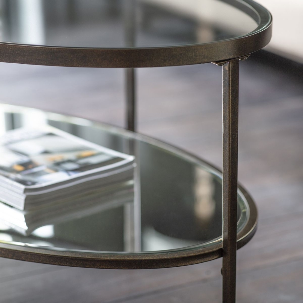 Product photograph of Hudson Clear Glass And Bronze Oval Coffee Table from Choice Furniture Superstore.