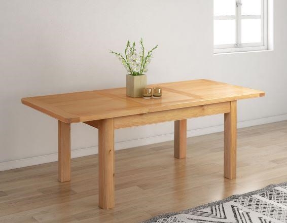 Product photograph of Clarion Oak 4 Seater Butterfly Extending Dining Table from Choice Furniture Superstore.