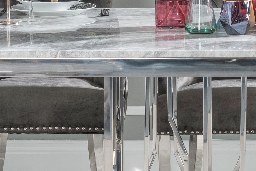 Product photograph of Vortex Marble Dining Table Set Rectangular Grey Top And Steel Chrome Base With Grey Fabric Lion Knockerback Chairs With Chrome Legs from Choice Furniture Superstore.