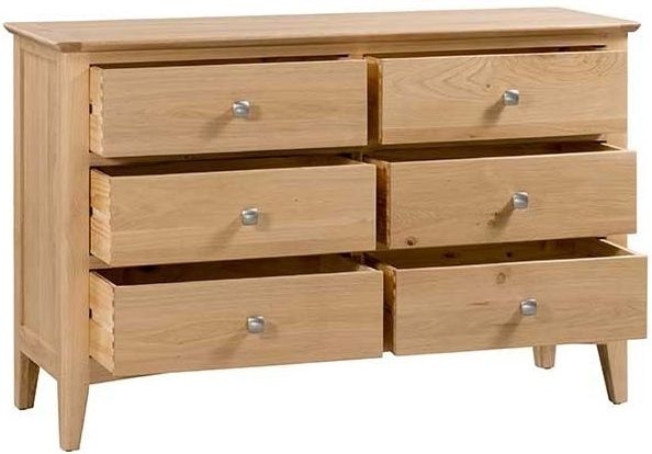 Product photograph of Lowell Natural Oak Wide Chest 6 Drawers from Choice Furniture Superstore.