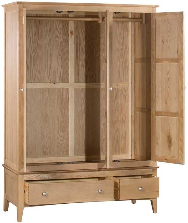 Product photograph of Lowell Natural Oak Triple Wardrobe 3 Doors With 2 Bottom Storage Drawers from Choice Furniture Superstore.