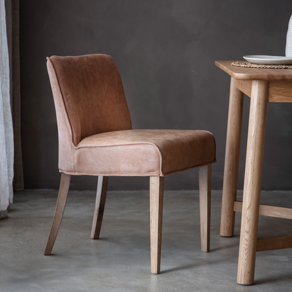 Product photograph of Tarnby Brown Leather Dining Chair Sold In Pairs from Choice Furniture Superstore.