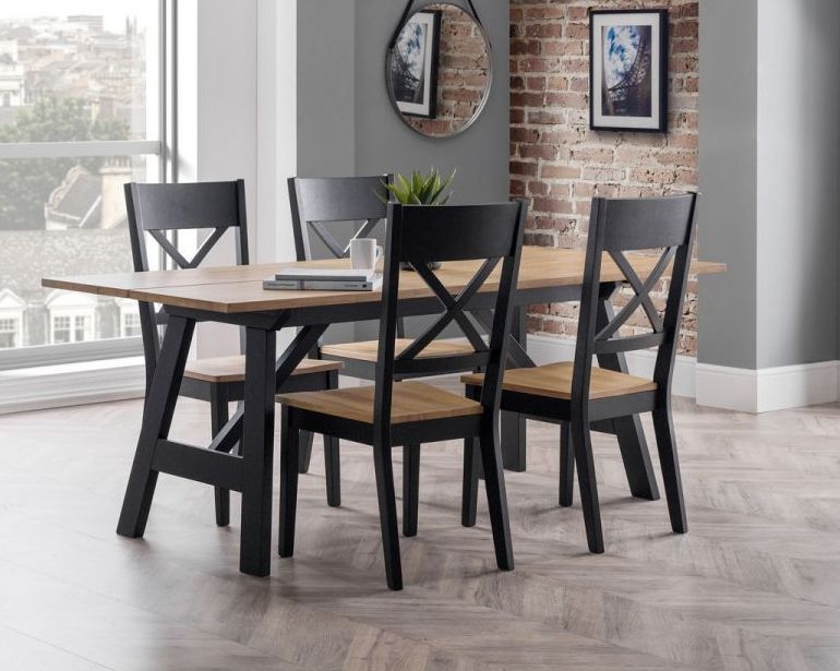 Product photograph of Hockley Black And Oak 2-4 Seater Dining Table With 4 Chairs from Choice Furniture Superstore.