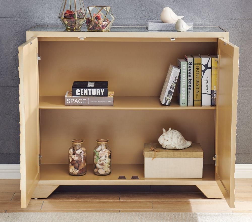 Product photograph of Frenso Gold Embossed 2 Door Small Sideboard With Mirrored Top from Choice Furniture Superstore.