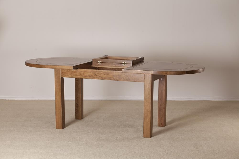Product photograph of Originals Rustic Oak Oval Extending Dining Table from Choice Furniture Superstore.