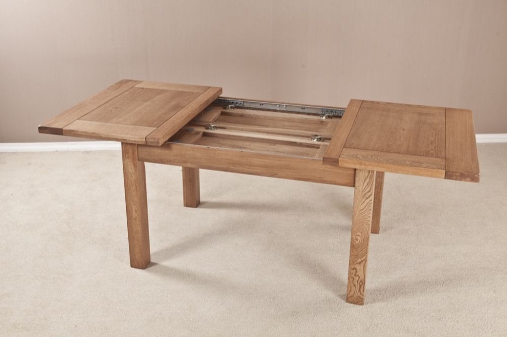 Product photograph of Kent Oak Extending Dining Table from Choice Furniture Superstore.