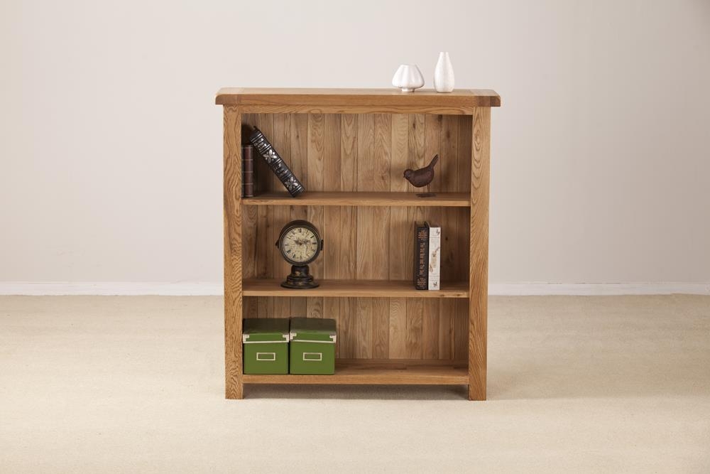 Product photograph of Kent Oak Low Wide Bookcase from Choice Furniture Superstore.