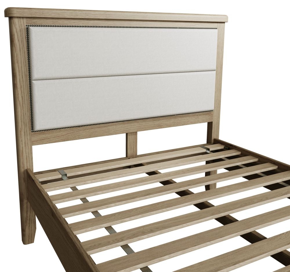 Product photograph of Hatton Oak Low Foot End Bed With Fabric Headboard from Choice Furniture Superstore.