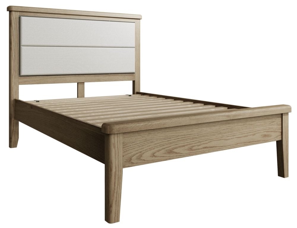 Product photograph of Hatton Oak Low Foot End Bed With Fabric Headboard from Choice Furniture Superstore.