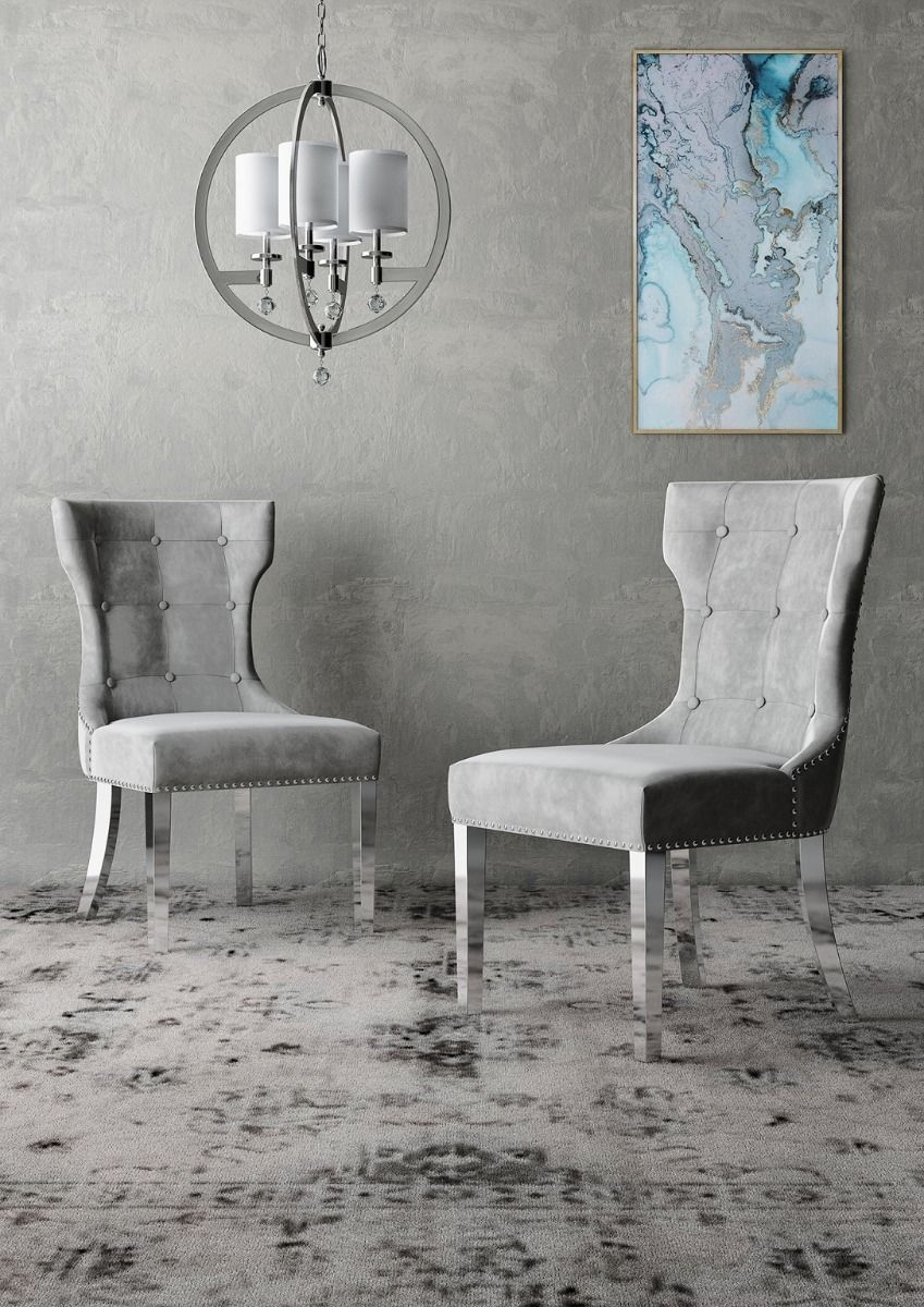 Product photograph of Tetlin Cloudy Grey Leather And Chrome Dining Chair Sold In Pairs from Choice Furniture Superstore.