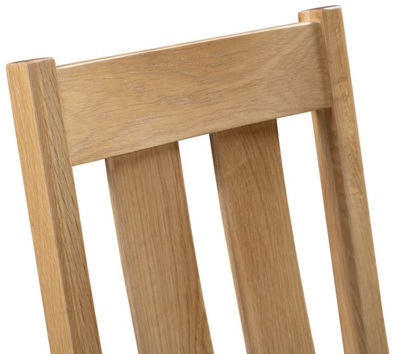 Product photograph of Cotswold Oak Dining Chair Sold In Pairs from Choice Furniture Superstore.