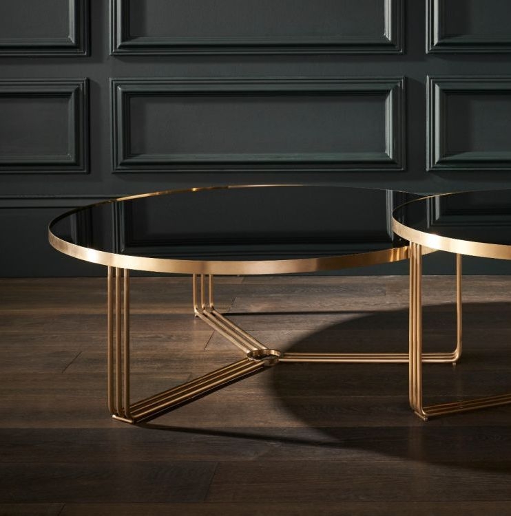 Product photograph of Finn Black Glass And Brass Metal Large Round Coffee Table from Choice Furniture Superstore.