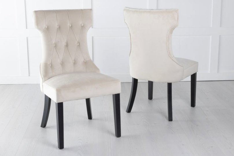 Product photograph of Courtney Champagne Dining Chair Tufted Velvet Fabric Upholstered With Black Wooden Legs from Choice Furniture Superstore.