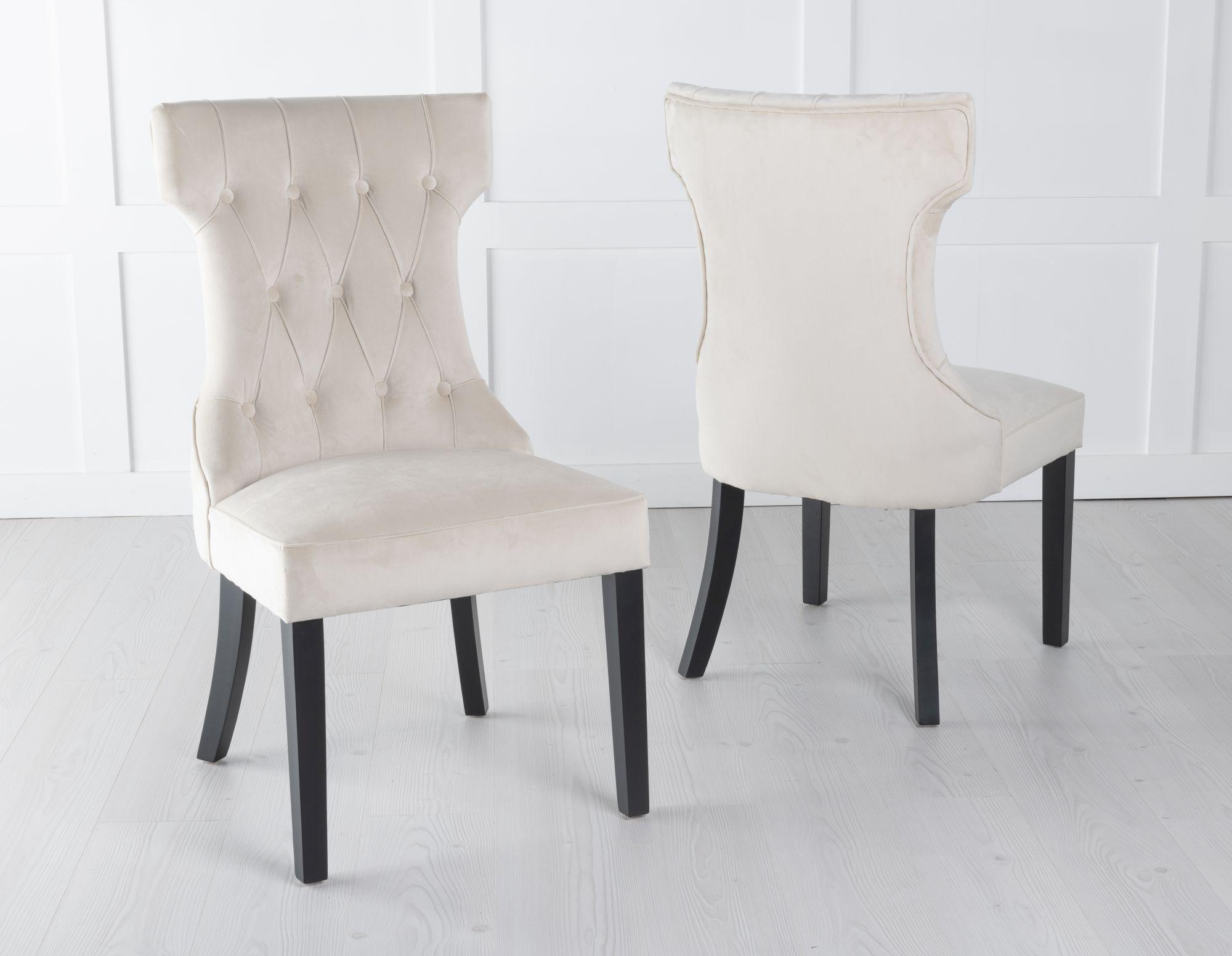 Product photograph of Courtney Champagne Velvet Fabric Large High Back Dining Chair With Black Legs from Choice Furniture Superstore.