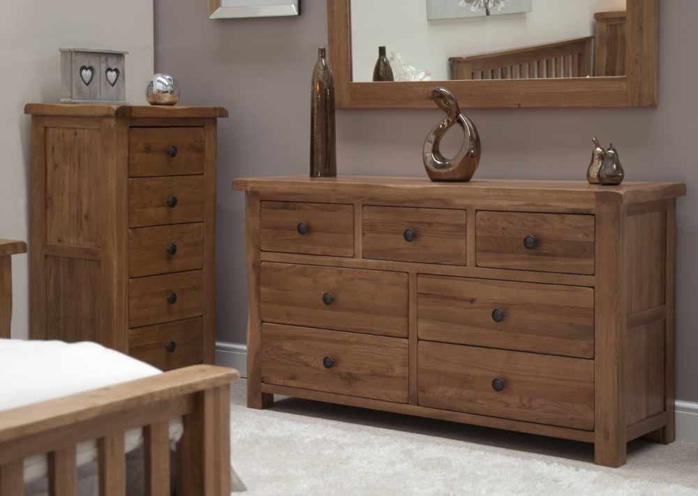 Product photograph of Homestyle Gb Rustic Oak 4 3 Drawer Multi Chest from Choice Furniture Superstore.
