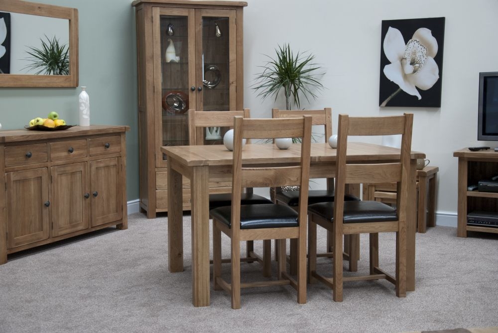 Product photograph of Homestyle Gb Rustic Oak Extending Dining Set And 4 Rustic Leather Seat Chairs from Choice Furniture Superstore.