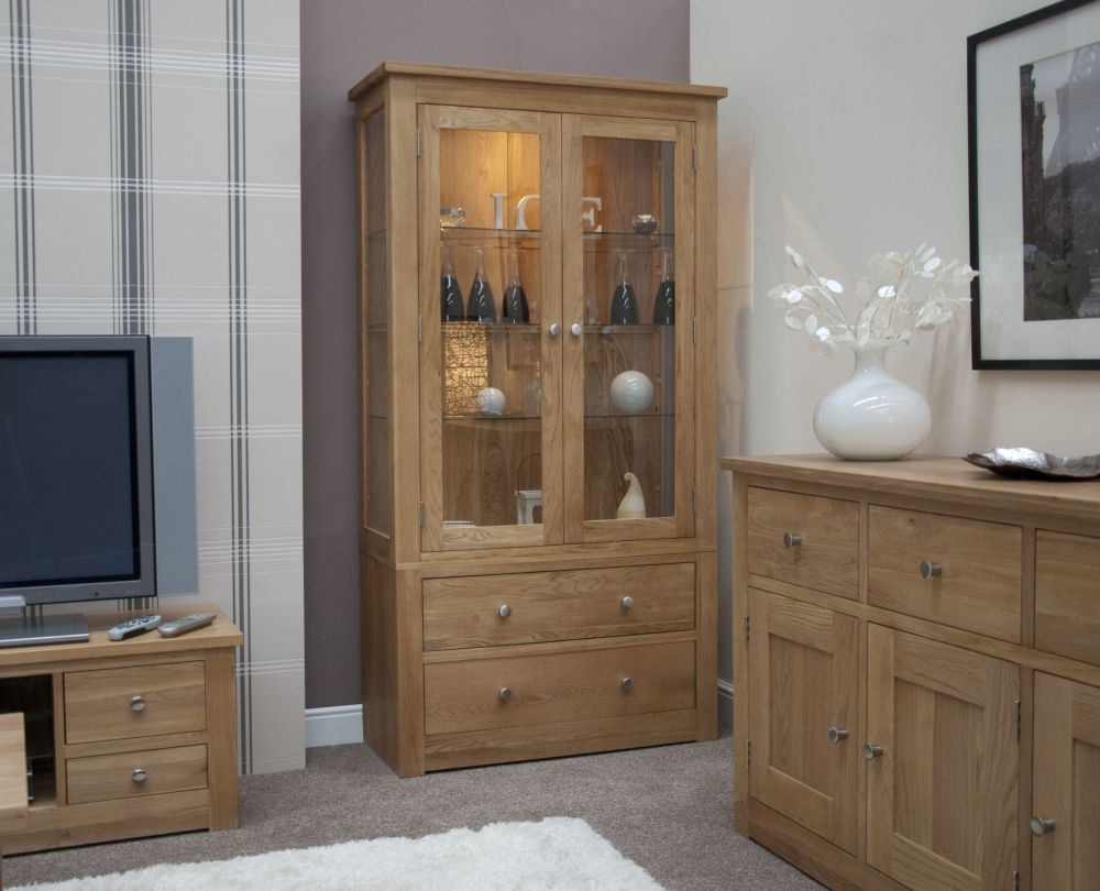 Product photograph of Oakley Oak Glass Display Cabinet from Choice Furniture Superstore.