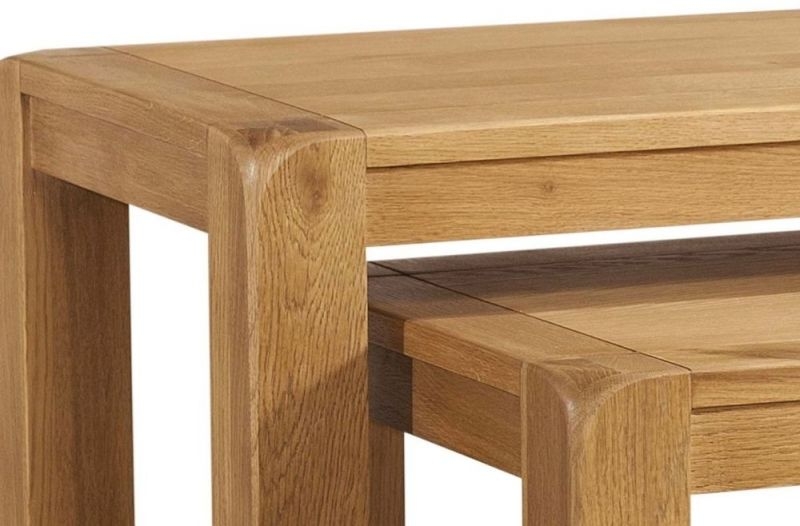 Product photograph of Curve Oak Large Nest Of 2 Tables from Choice Furniture Superstore.