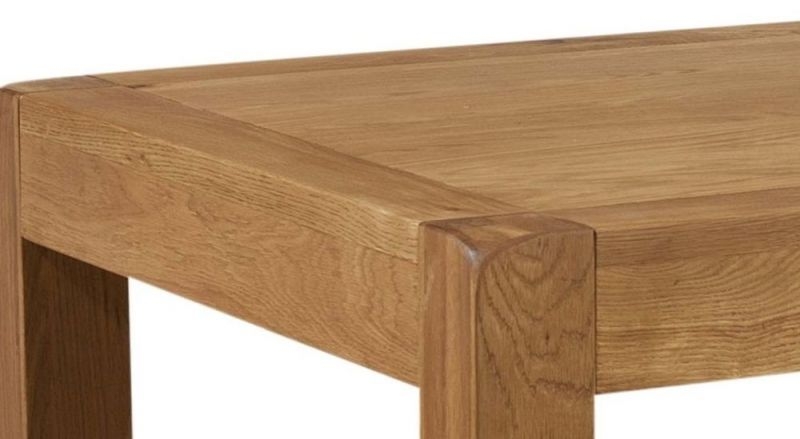 Product photograph of Curve Oak Small Dining Table - 4 Seater from Choice Furniture Superstore.