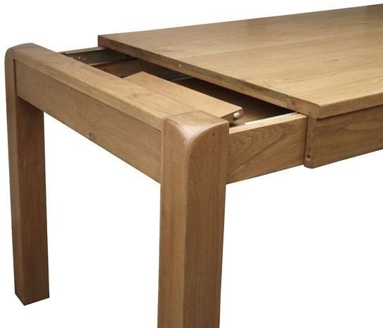 Product photograph of Curve Oak 4 Seater Extending Dining Table from Choice Furniture Superstore.