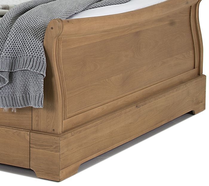 Product photograph of Vida Living Carmen Oak Sleigh Bed from Choice Furniture Superstore.