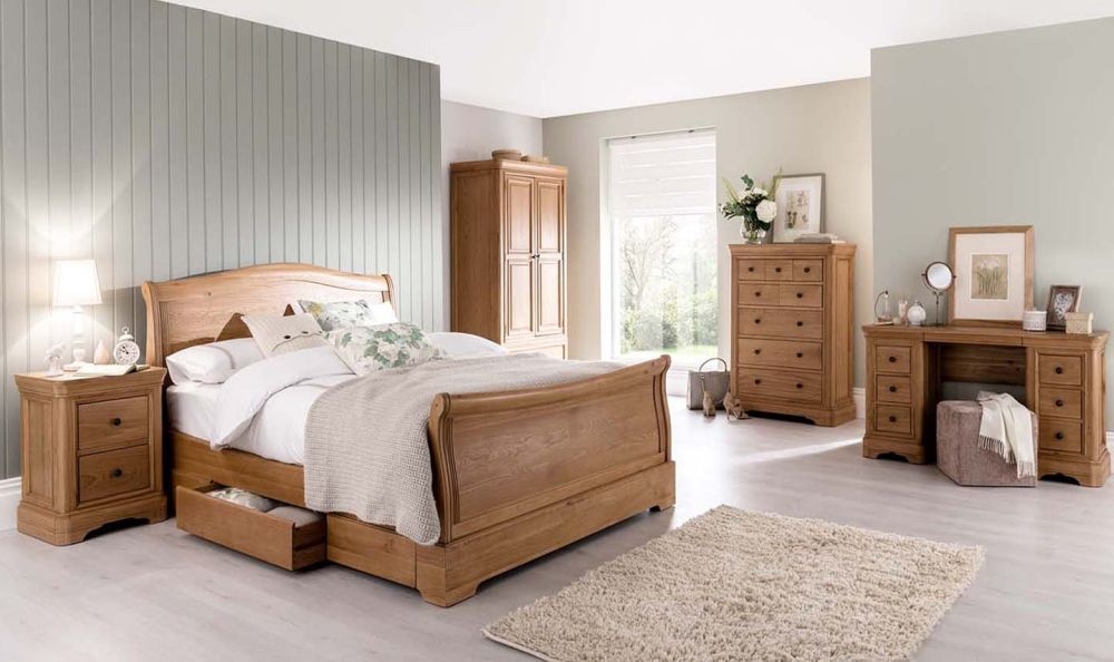 Product photograph of Vida Living Carmen Oak Sleigh Bed from Choice Furniture Superstore.