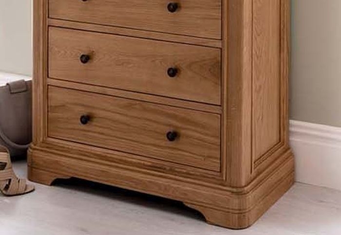 Product photograph of Vida Living Carmen Oak 8 Drawer Tall Chest from Choice Furniture Superstore.
