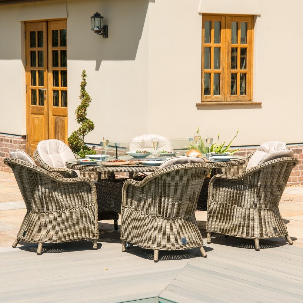 Product photograph of Maze Winchester Heritage 6 Seat Oval Rattan Fire Pit Dining Set from Choice Furniture Superstore.