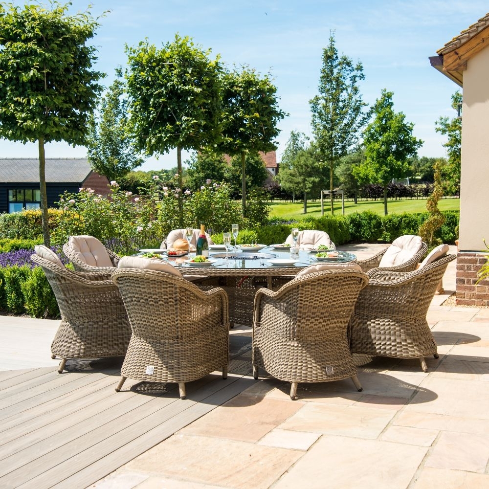 Product photograph of Maze Winchester Heritage 8 Seat Round Rattan Fire Pit Dining Set With Lazy Susan from Choice Furniture Superstore.