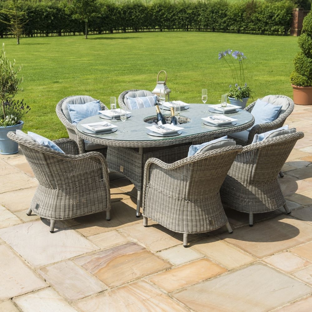Product photograph of Maze Oxford Heritage 6 Oval Rattan Dining Set With Ice Bucket And Lazy Susan from Choice Furniture Superstore.