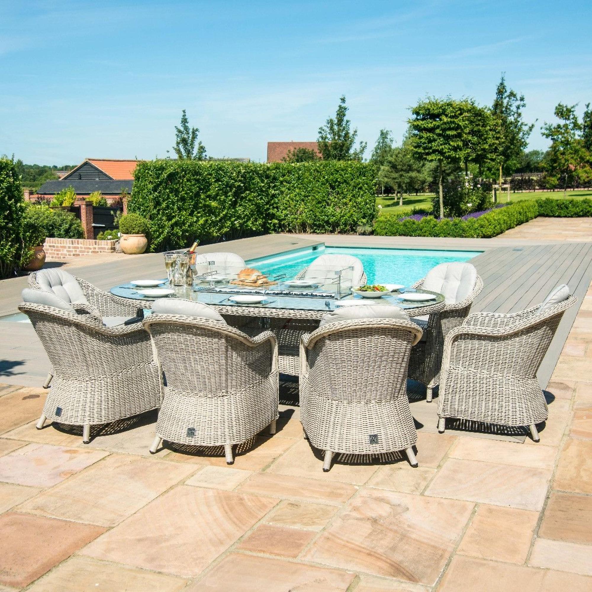 Product photograph of Maze Oxford Heritage 8 Seat Oval Rattan Fire Pit Dining Set from Choice Furniture Superstore.