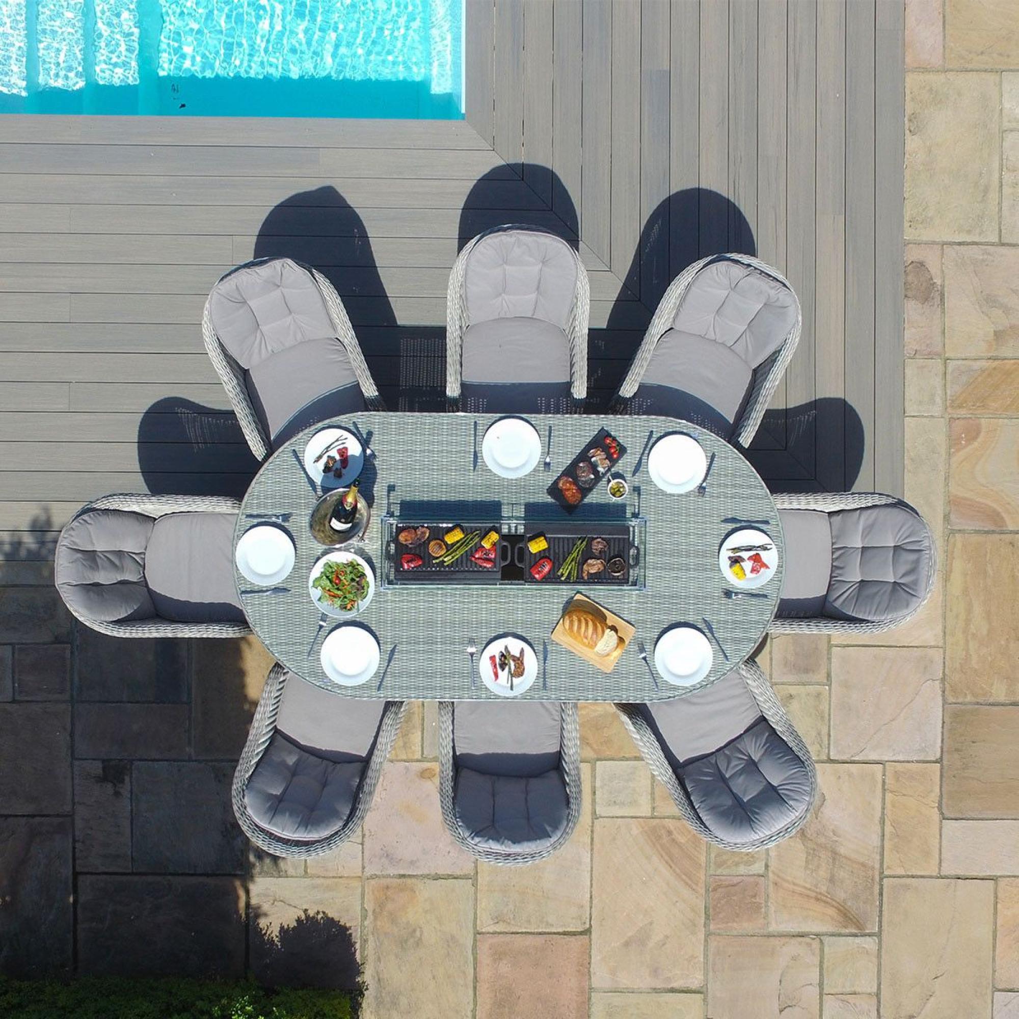 Product photograph of Maze Oxford Heritage 8 Seat Oval Rattan Fire Pit Dining Set from Choice Furniture Superstore.