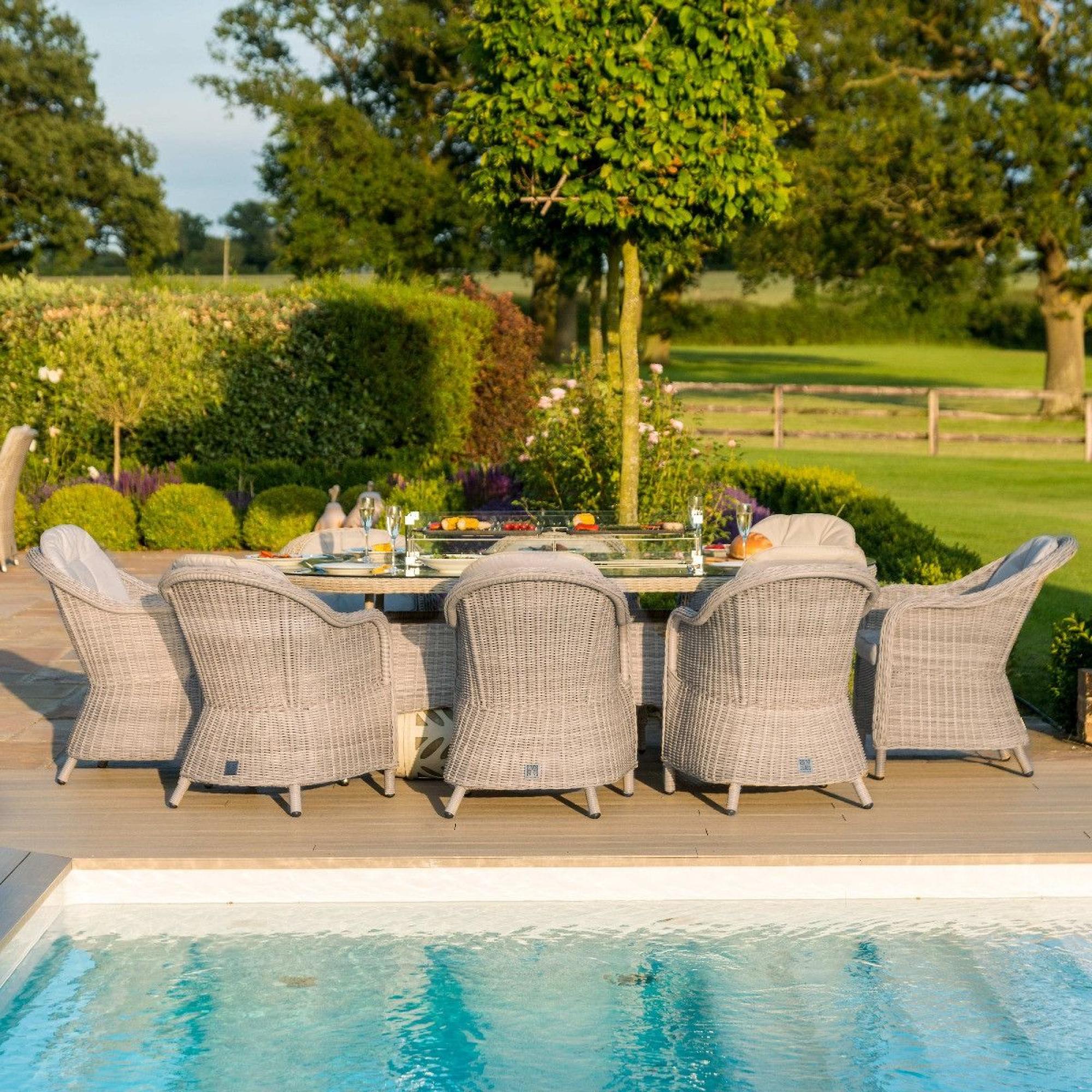 Product photograph of Maze Oxford Heritage 8 Seat Oval Rattan Fire Pit Dining Set from Choice Furniture Superstore.