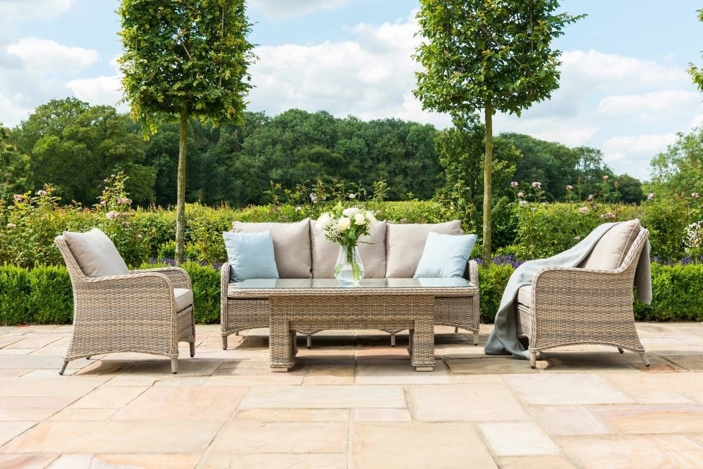 Product photograph of Maze Cotswold 3 Seat Rattan Sofa Dining Set With Rising Table And Footstools from Choice Furniture Superstore.